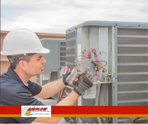 HVAC technician consulting with a homeowner about central air conditioning services