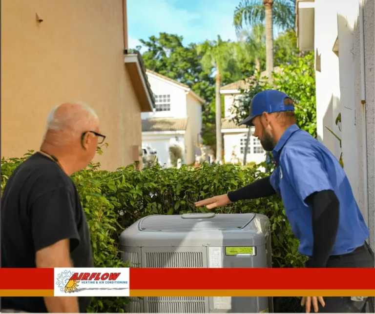 Technician performing routine maintenance on a residential central air conditioning system