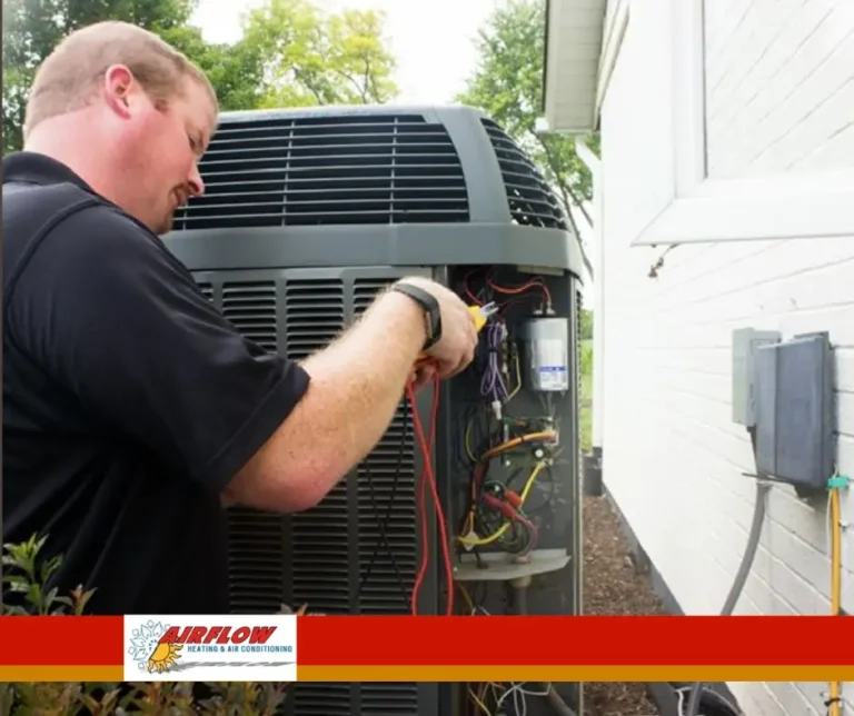 Technician installing a residential central air conditioning system